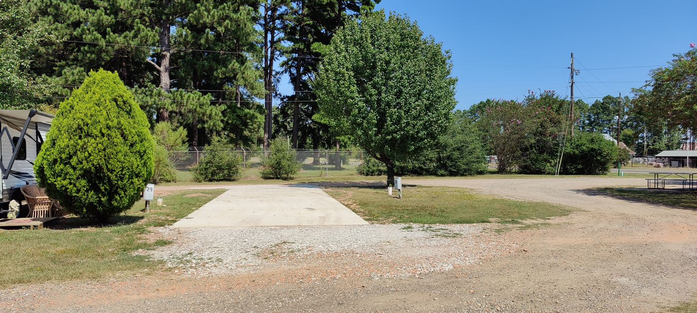 An open concrete RV pad, ready for a big rig